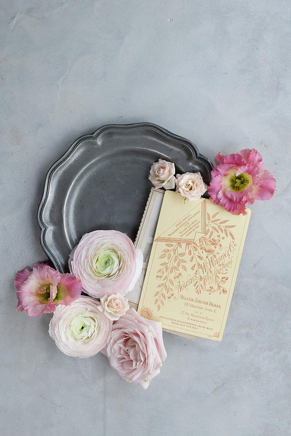 Vintage Invitation Card And Pink Flowers On Pewter Plate Photograph by Lucy Parissi