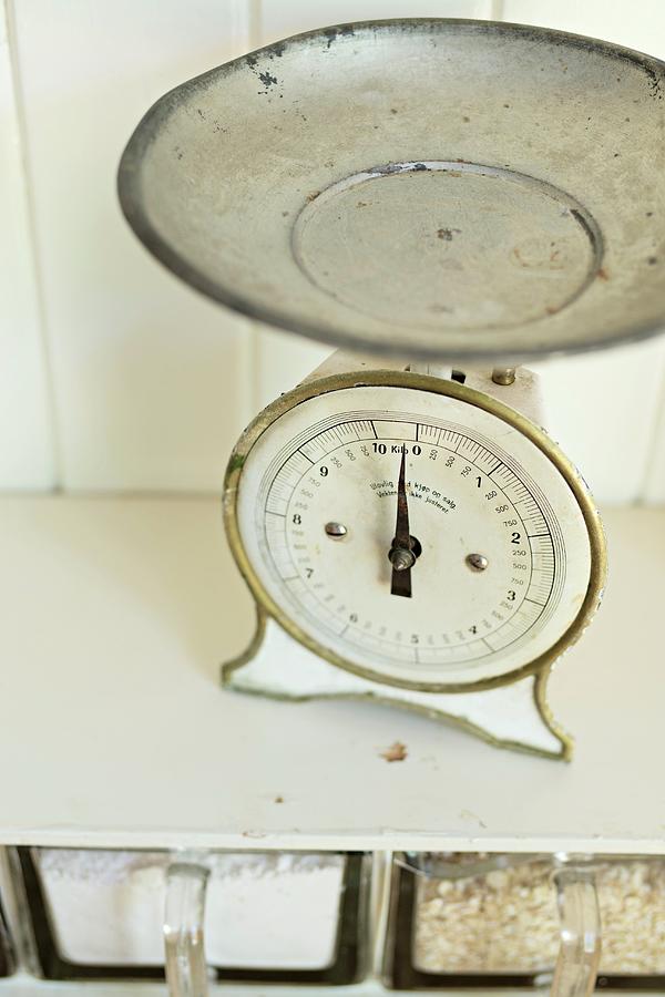 Vintage Kitchen Scales On White Shelf Photograph by Cecilia Mller