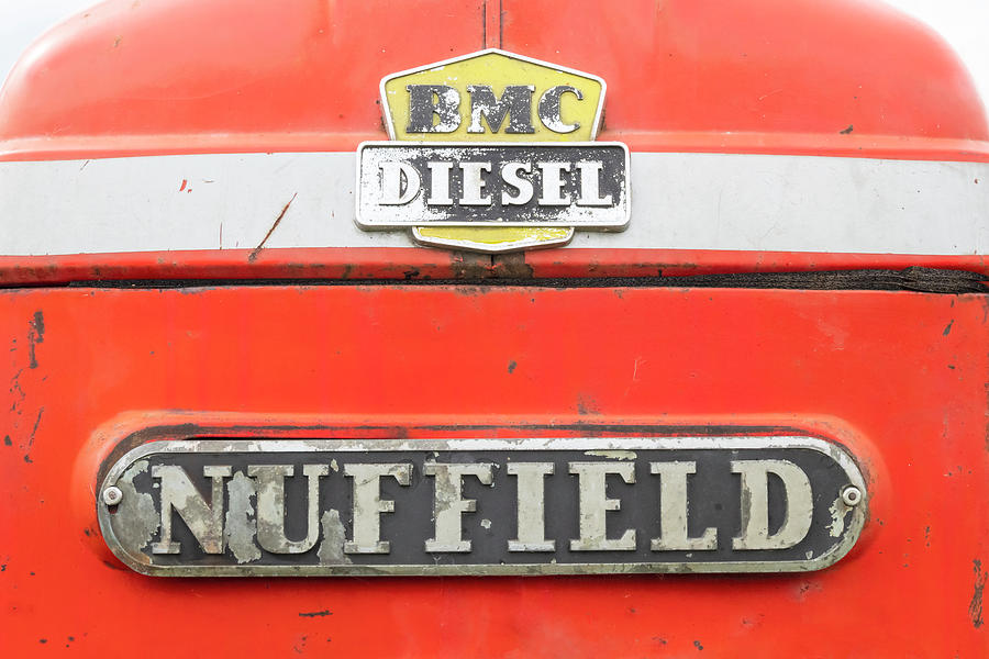 Vintage Tractor Photograph - Vintage Nuffield Tractor Badges by Richard Nixon