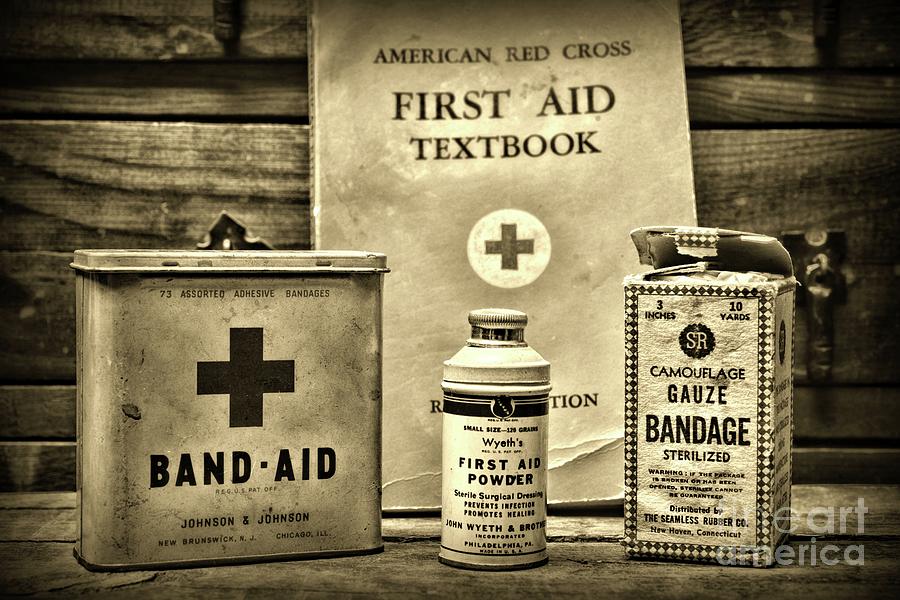 Vintage Red Cross First Aid Material sepia Photograph by Paul Ward
