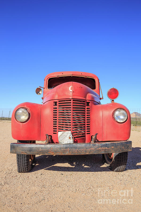 Vintage Red Truck in the Desert Photograph by Edward Fielding