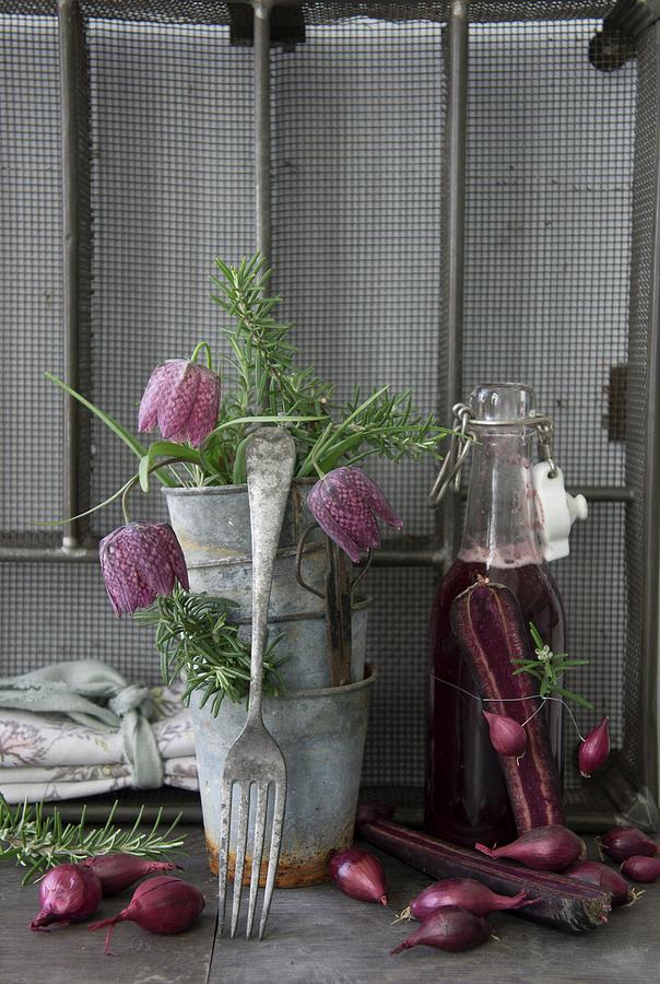 Vintage-style Arrangement Of Zinc Pots, Snakes Head Fritillaries, Onions And Swing-top Bottle Photograph by Martina Schindler
