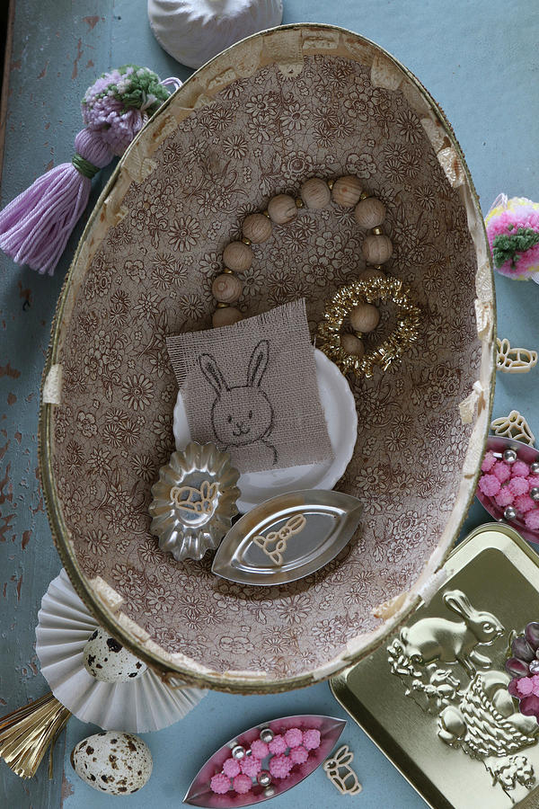 Vintage-style Easter Arrangement Of Knick-knacks In Old Cardboard Egg Photograph by Regina Hippel