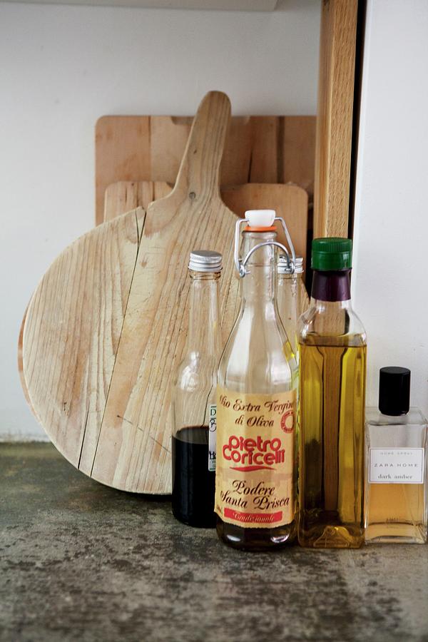 Vintage, Swingtop Bottle And Bottles Of Vinegar And Oil In Front Of