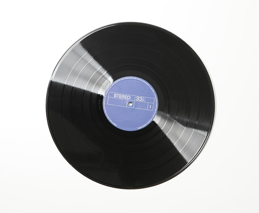 Vinyl Record On White Background Photograph by Vincenzo Lombardo