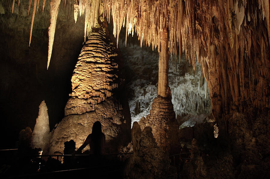 Visitor Enjoys Cave Stalagmites Photograph by Milehightraveler