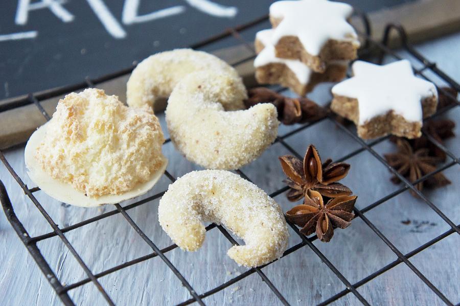 Wafer Biscuits With A Coconut Crust, A Vanilla Dip, Cinnamon Star And Star Anise Photograph by Martina Schindler
