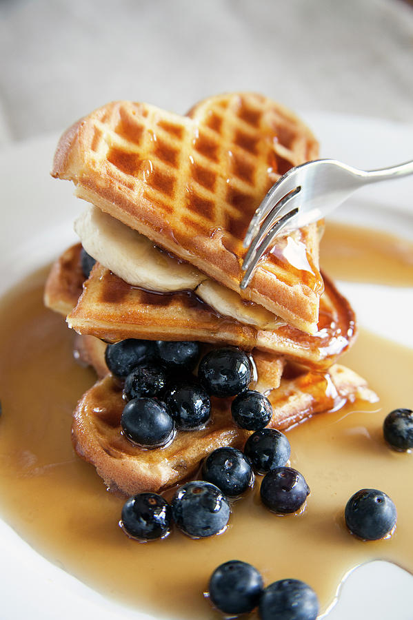 Waffels With Golden Syrup And Blue Photograph by Devin Hart