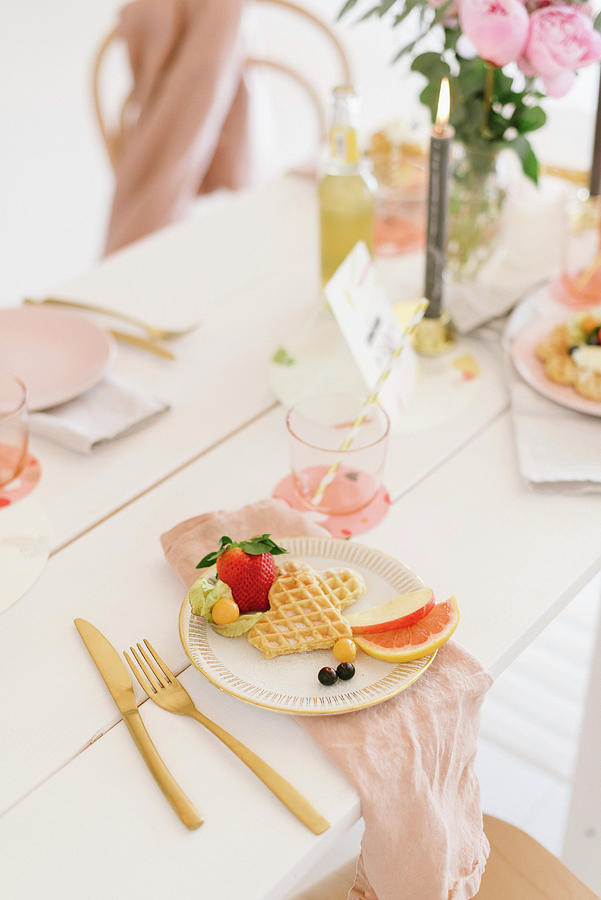 Waffles And Fruit On Table Festively Set In Delicate Pink Shades Photograph by Katja Heil