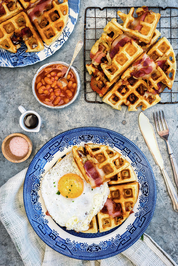Waffles With Bacon And A Fried Egg For Breakfast Photograph by Lucy Parissi
