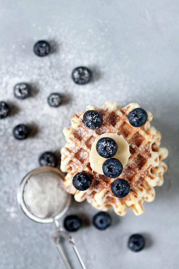 Waffles With Banana And Blueberry, Dusted With Powdered Sugar Photograph by Sonya Baby