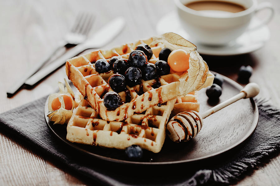 Waffles With Blueberries And Maple Syrup Photograph by Valeria Aksakova