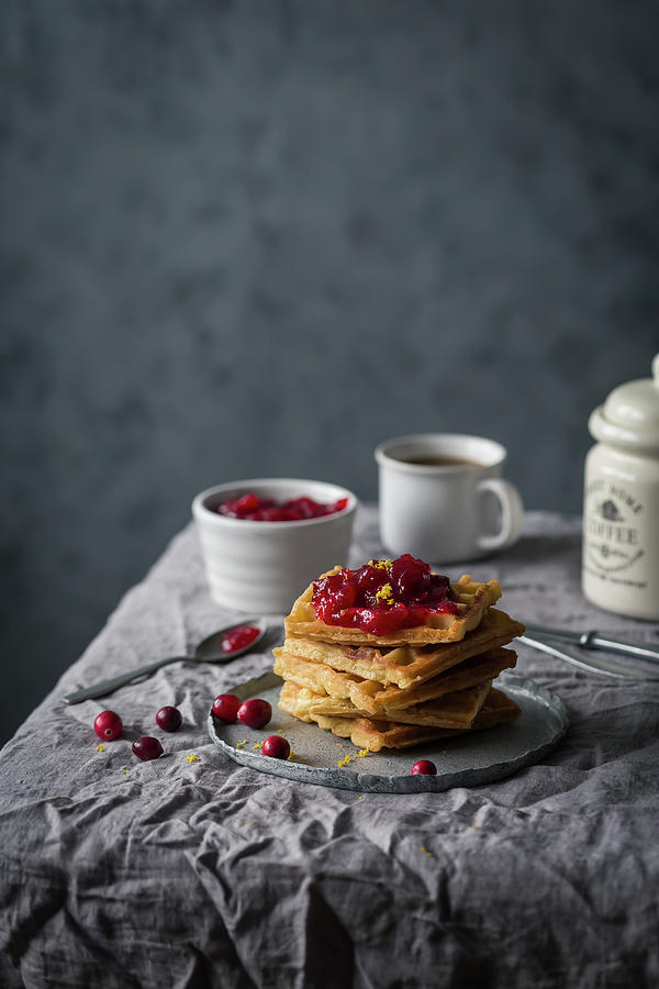 Waffles With Cranberry Sauce On A Breakfast Table Photograph by Malgorzata Laniak