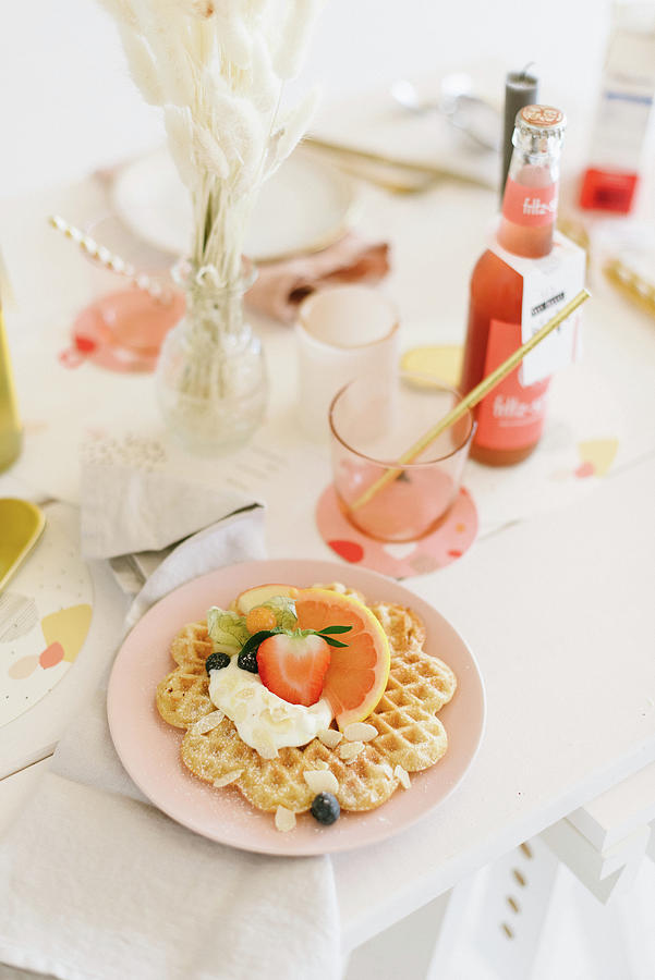 Waffles With Fruit And Cream On Festively Set Table Photograph by Katja Heil