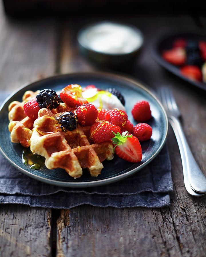 Waffles With Vanilla Ice-cream And Berries Photograph by Tom Regester