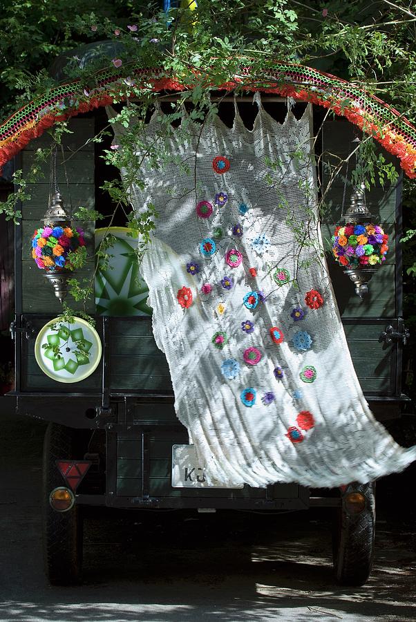 Wafting Curtain With Appliqu Floral Motifs And Colourful Crocheted Trim Decorating Vehicle Photograph by Matteo Manduzio