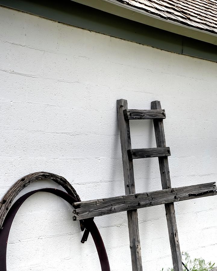 Wagon Wheel And Ladder Photograph by Jerry Sodorff