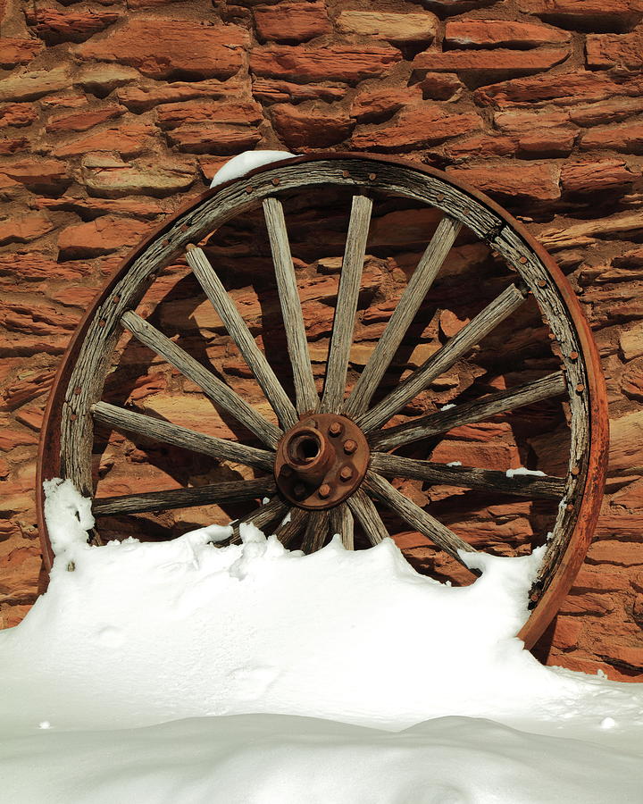 Wagon Wheel and Snow Photograph by Roupen Baker