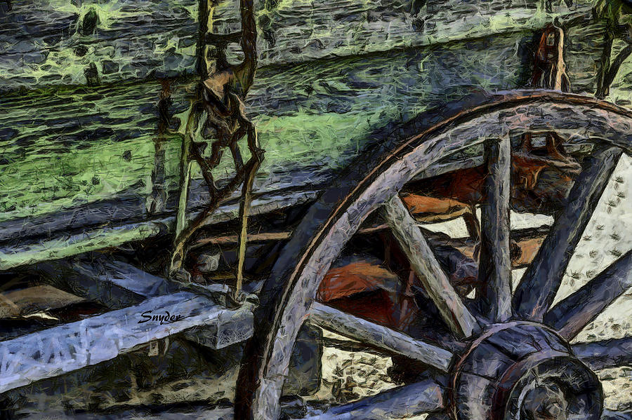 Wagon Wheel on a Green Wagon Photograph by Floyd Snyder