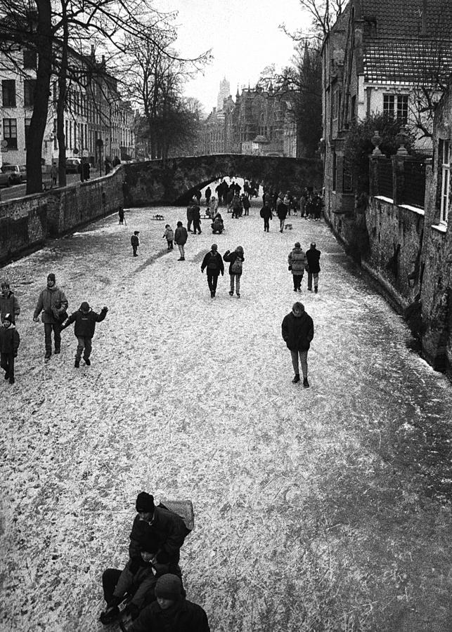Walking On Ice In Bruges Photograph by Yvette Depaepe