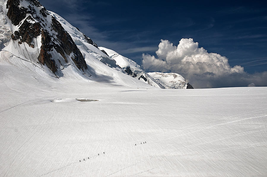 Walking On The Glacier Photograph by Marco Tomassini