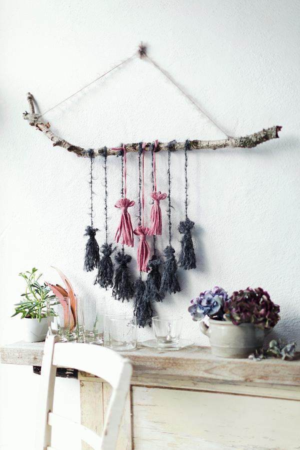 Wall Decoration Made From Birch Branch And Tassels Hand-made From Wool Remnants Photograph by Sabine Lscher