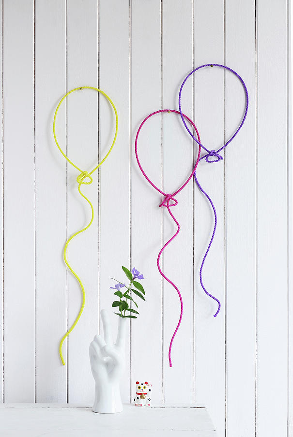 Wall Decorations Shaped Like Balloons Made From Wire And Knitted Tubes Photograph by Thordis Rggeberg