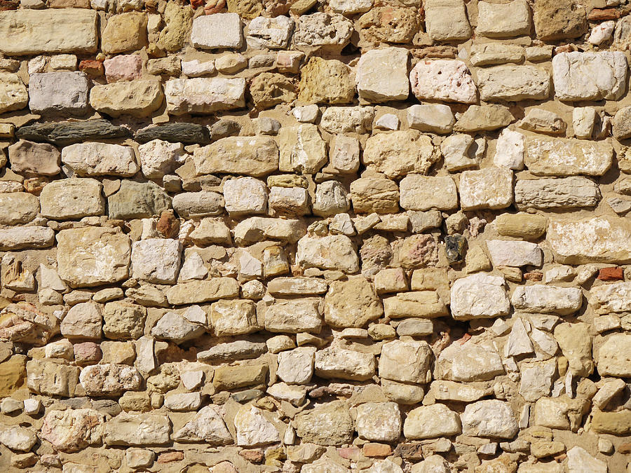 Wall made of uneven rocks Photograph by Tosca Weijers