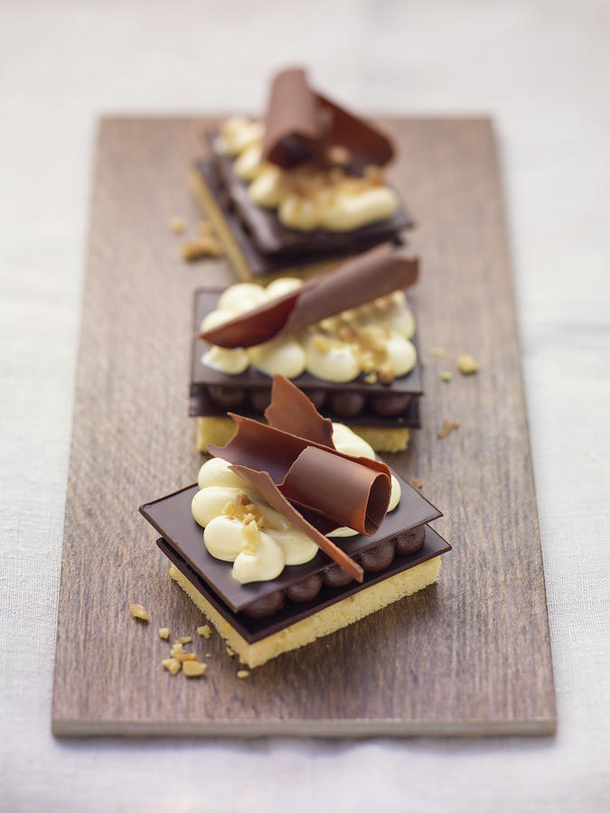 Walnut Slices With Chocolate Cream Photograph by Eising Studio