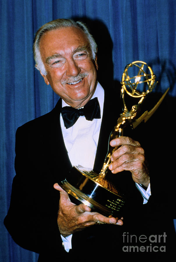 Walter Cronkite Holding Emmy Award Photograph by Bettmann