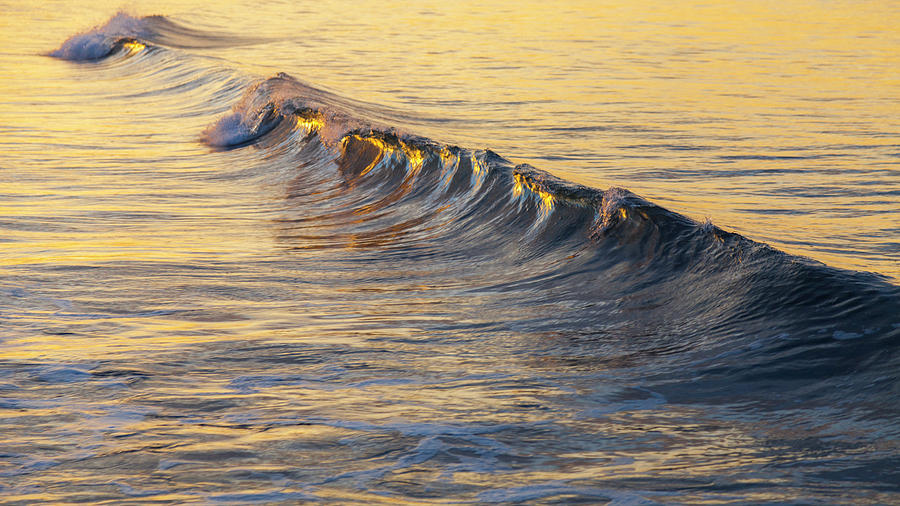 Beach Photograph - Warm Curl by Chris Moyer
