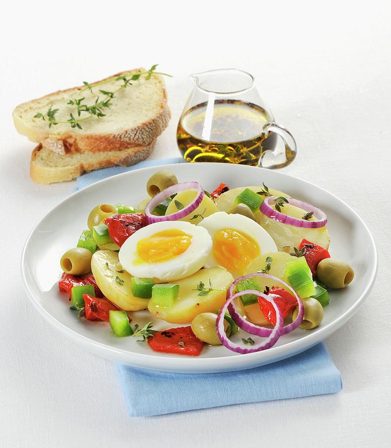 Warm Potato Salad With Peppers, Olives, Onions And A Soft Boiled Egg Photograph by Franco Pizzochero