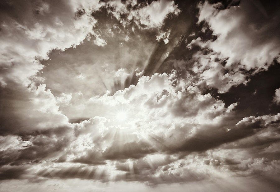 Warm Sun Filtering Through Clouds Photograph by Georgeclerk