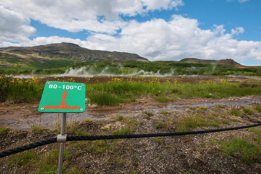 Summer Photograph - Warning Signs At The Geysir Hot Spring Area In Iceland by Cavan Images