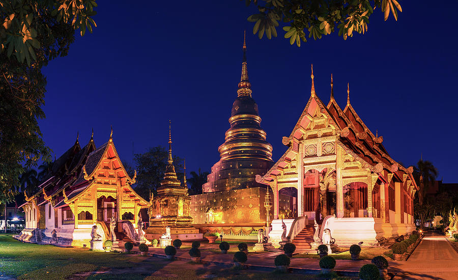 Wat Phra Singh at dusk, Chiang Mai, Thailand Photograph by Lukasz ...