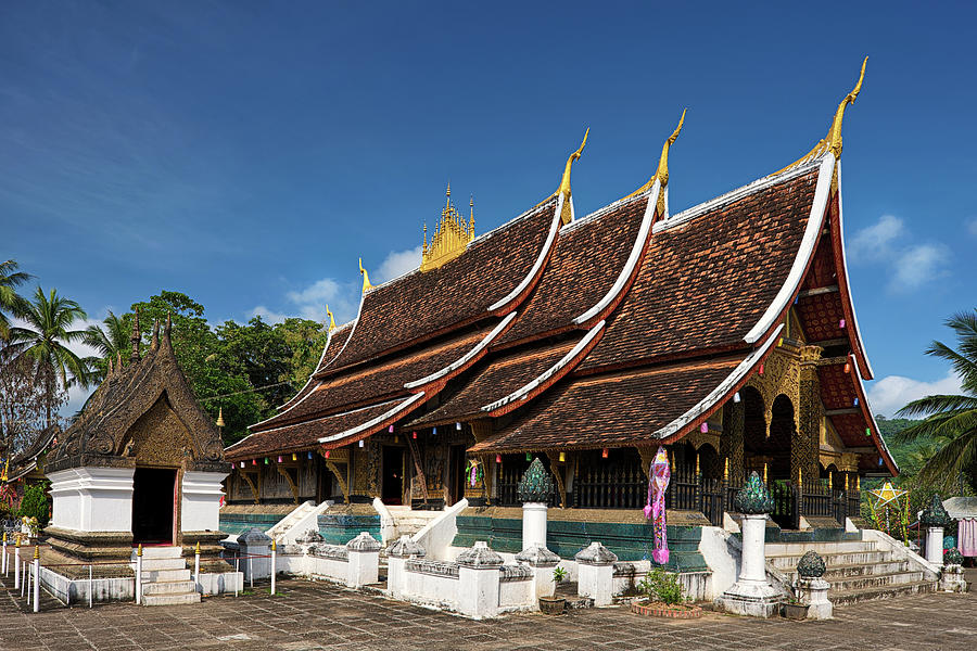 Wat Xieng Thong - Buddhist Temple In Photograph by Hadynyah