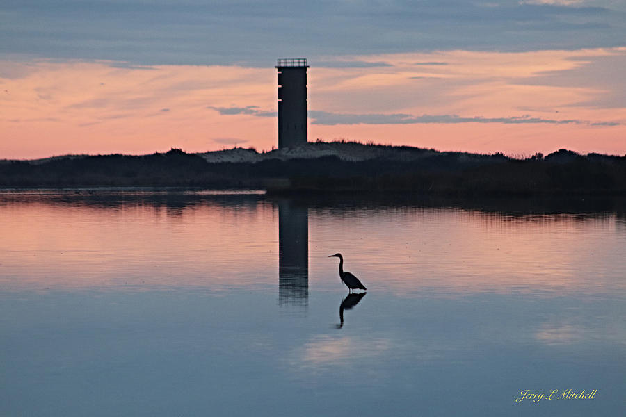 Watchtower reflections Photograph by Jerry Mitchell