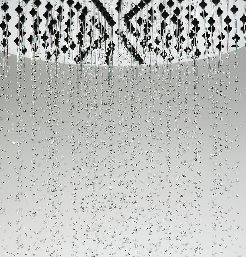 Water Drops Falling From Shower Head Photograph by Walter Zerla