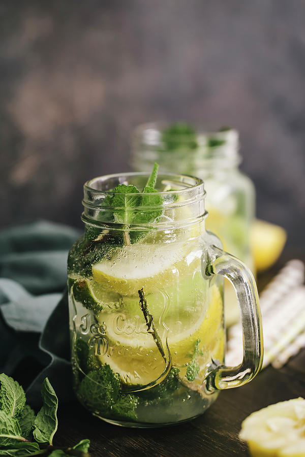 Water Flavoured With Lemon, Lime And Mint detox Photograph by Valeria Aksakova