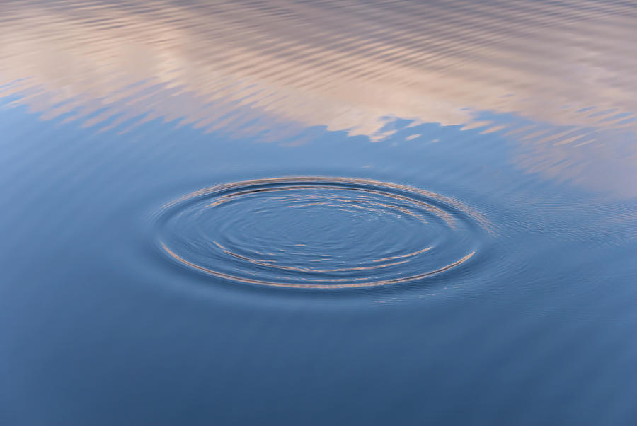Water Ripples And Reflections Photograph by Sochanam