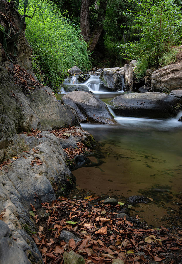 Water stream on the river with small waterfalls Photograph by Michalakis Ppalis