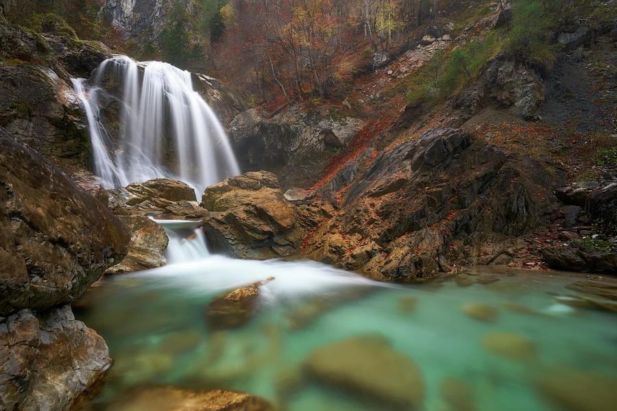 Waterfall In The Autumnal Garnitzenklamm, Carinthia, Austria. Photograph by Nadine Schmalzer