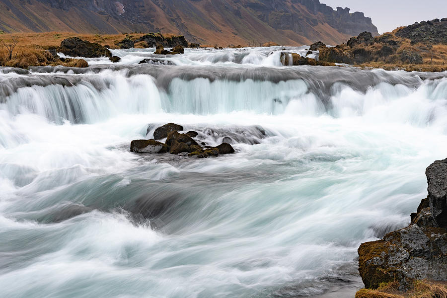 Waterfall on the Fossalar River in Iceland Photograph by Mark Hunter