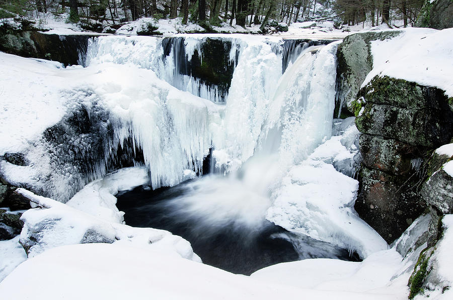 Waterfalls Covered In Snow With Flowing Photograph by Noppawat Tom Charoensinphon