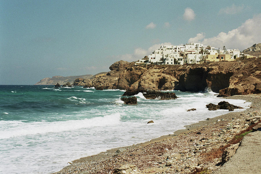 Waterfront And Cliffs In Naxos Photograph by Deimagine