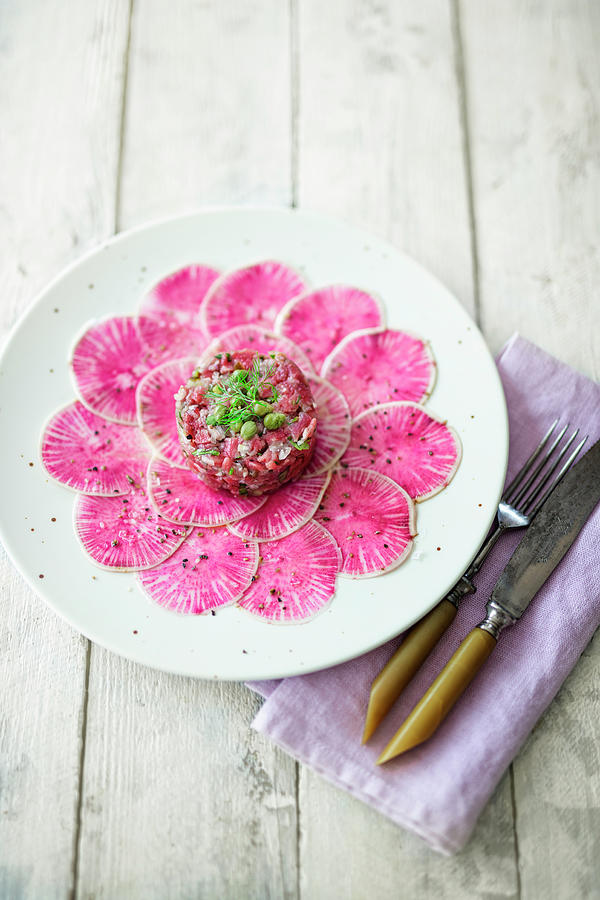 Watermelon And Radish Carpaccio With Beef Tartare And Capers low Carb Photograph by Jan Wischnewski