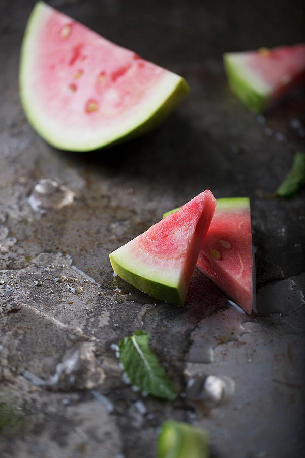 Watermelon Slices On A Metallic Background With Ice And Mint Photograph by Amelia Johnson