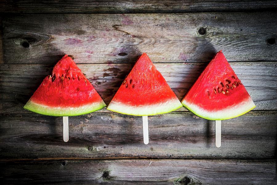 Watermelon Slices On Sticks Photograph by Alena Haurylik