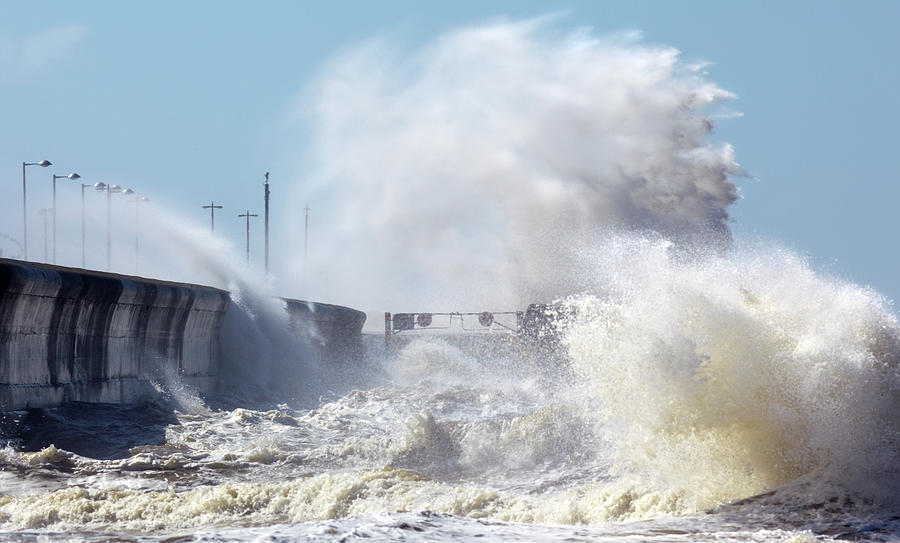 Waves Crashing Onto Seafront In Stormy Photograph by Elgol