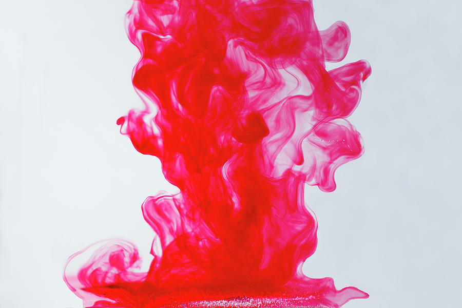 Waves Of Red Ink In Water On White Background Photograph by Cavan ...